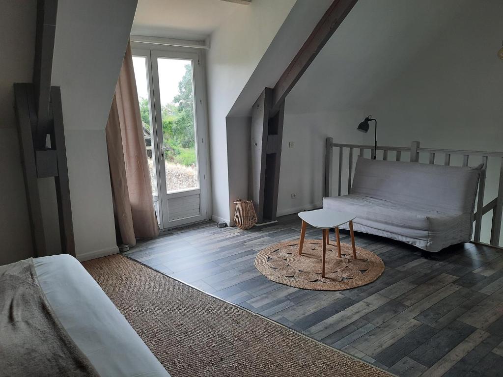 Postel nebo postele na pokoji v ubytování Le clos des sources