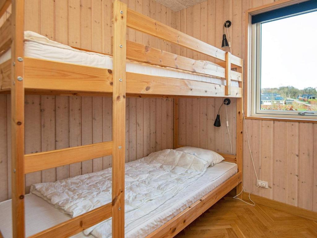 Postel nebo postele na pokoji v ubytování 10 person holiday home in Haderslev-By Traum