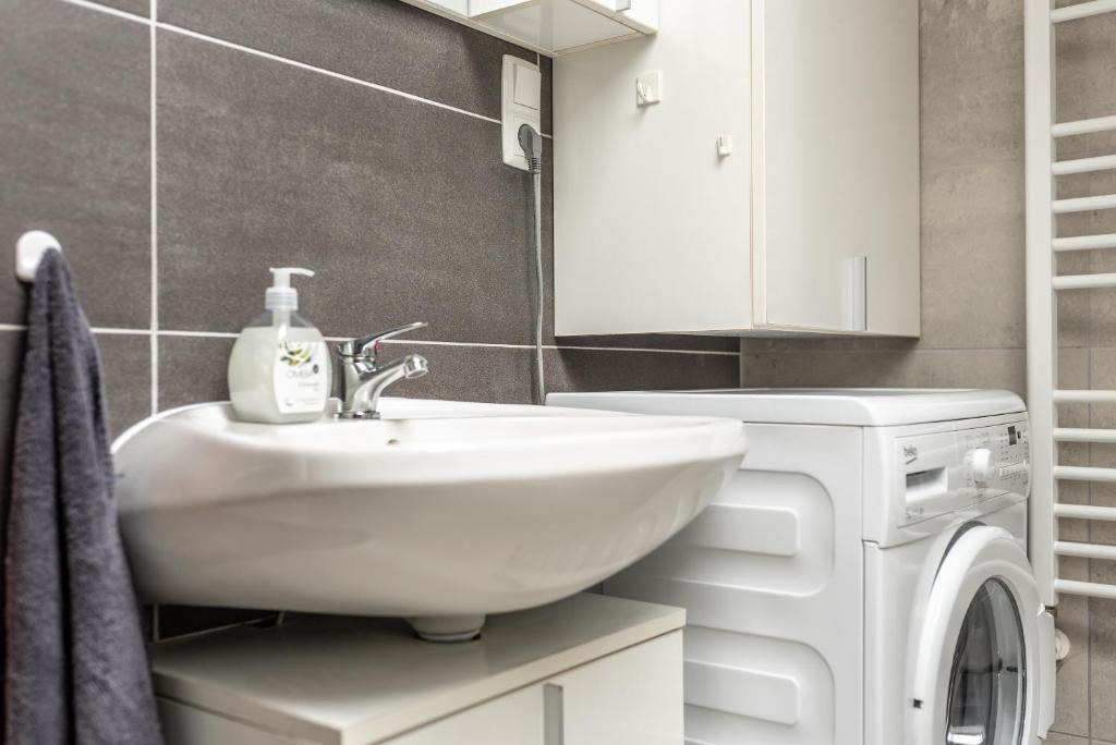 Koupelna v ubytování Grand 56 Apartman-Keszthely