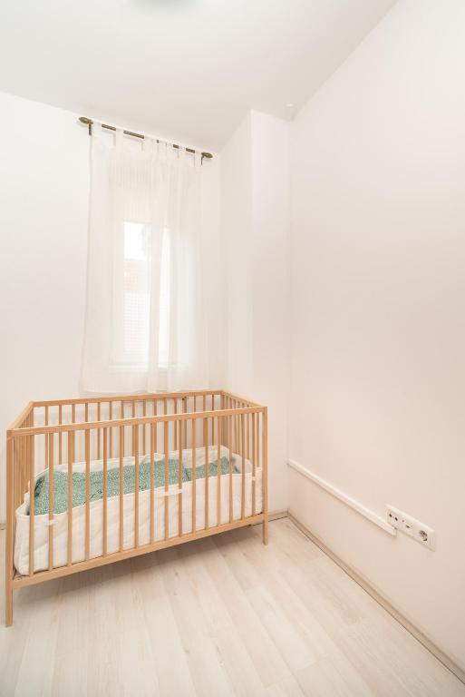 Postel nebo postele na pokoji v ubytování Grand 56 Apartman-Keszthely