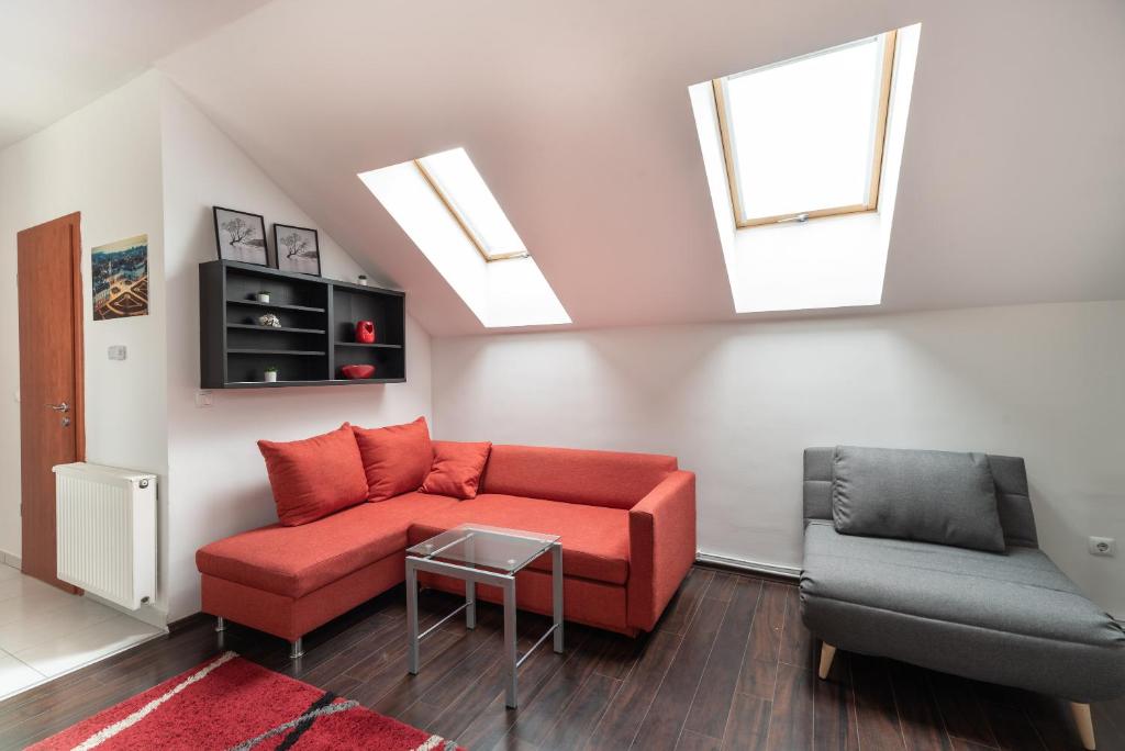 Posezení v ubytování Grand 56 Apartman-Keszthely