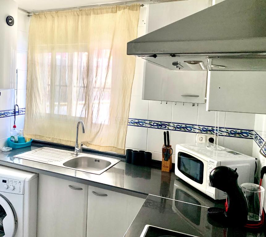 Kuchyň nebo kuchyňský kout v ubytování Casita a 3 minutos de la playa con Aire Acondicionado e Internet