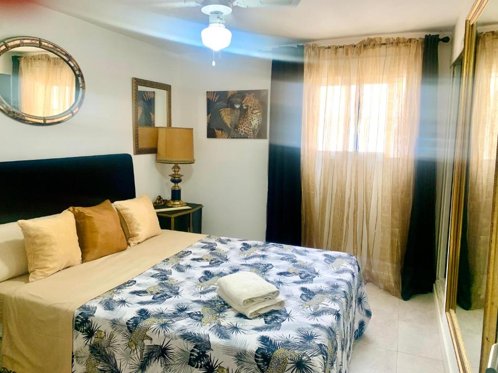 Postel nebo postele na pokoji v ubytování Casita a 3 minutos de la playa con Aire Acondicionado e Internet