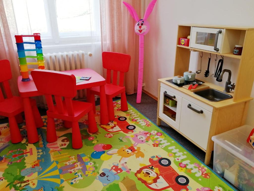 Kuchyň nebo kuchyňský kout v ubytování Flamingo Apartments