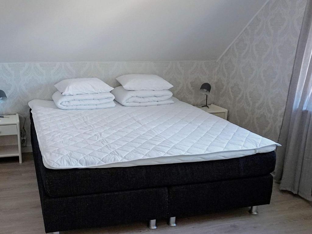 Postel nebo postele na pokoji v ubytování Holiday home LJUNG