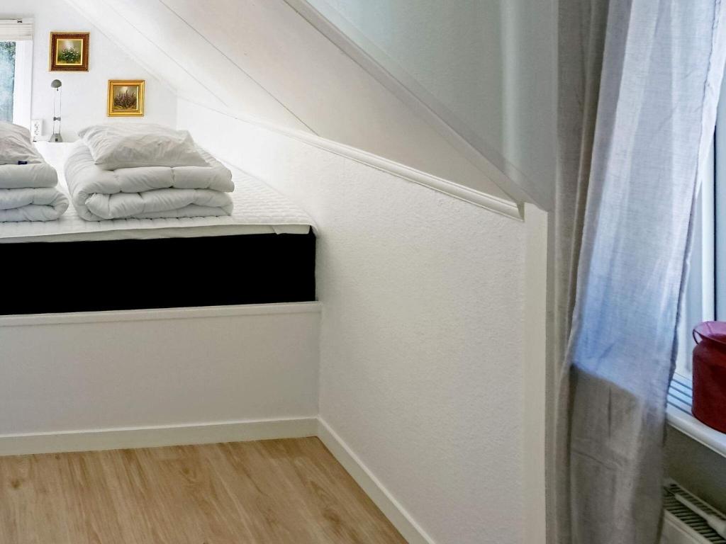 Postel nebo postele na pokoji v ubytování Holiday home LJUNG