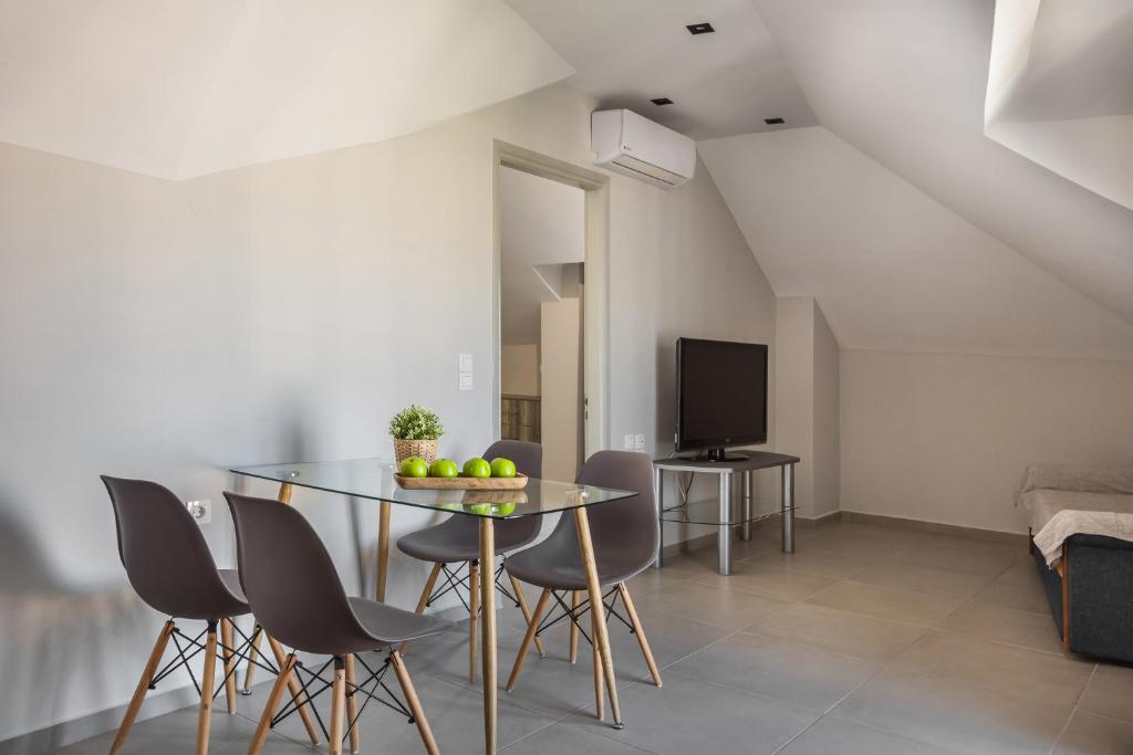 Telewizja i/lub zestaw kina domowego w obiekcie Fidias city rooms