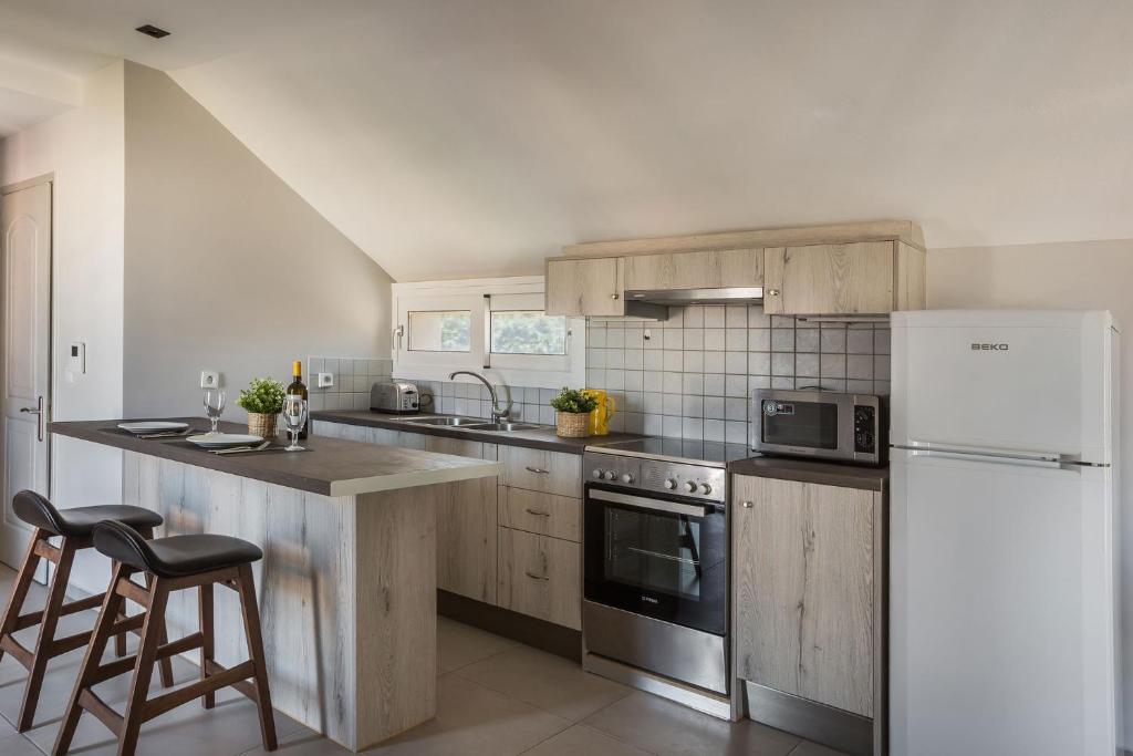 Kuchnia lub aneks kuchenny w obiekcie Fidias city rooms
