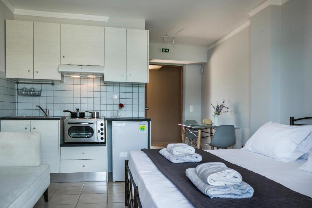 Kuchnia lub aneks kuchenny w obiekcie Fidias city rooms