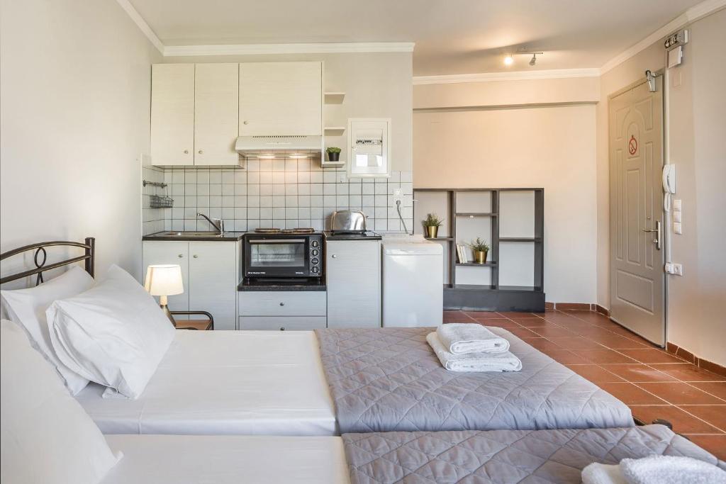 Kuchnia lub aneks kuchenny w obiekcie Fidias city rooms