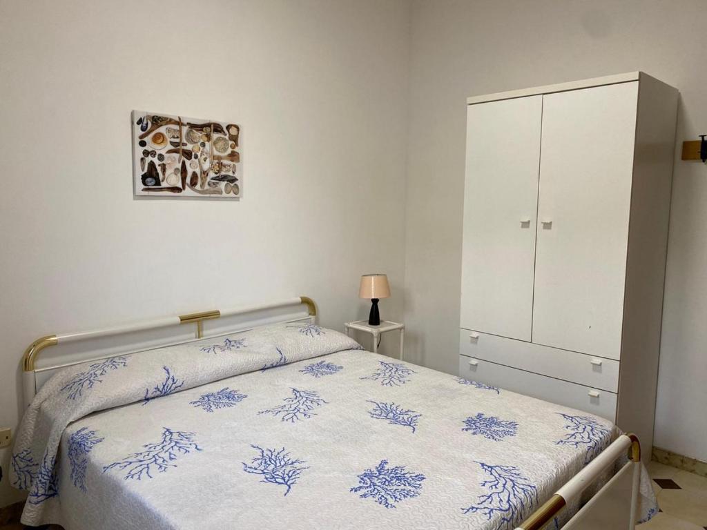 Posteľ alebo postele v izbe v ubytovaní Casa di Diego - Primo Piano By Cala Salento