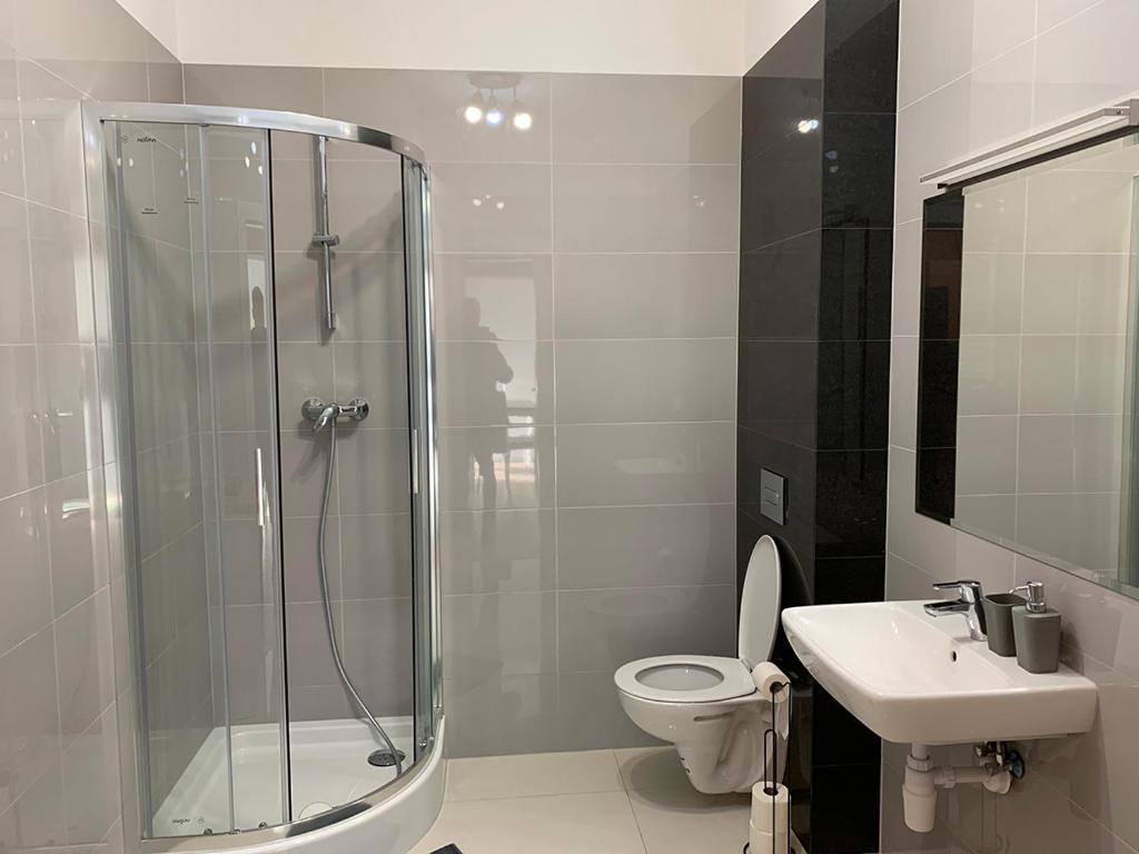 Kúpeľňa v ubytovaní Apartamenty Nadjeziorna