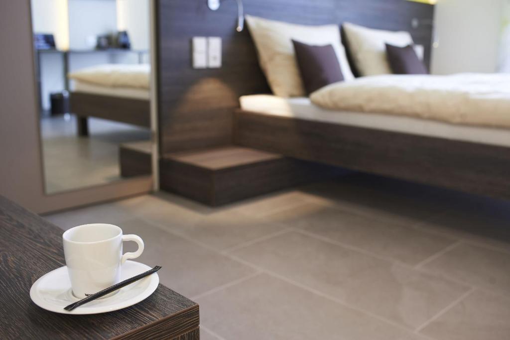Posteľ alebo postele v izbe v ubytovaní eee Hotel Marchtrenk