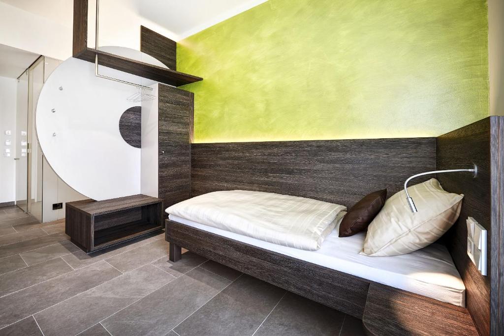 Posteľ alebo postele v izbe v ubytovaní eee Hotel Marchtrenk