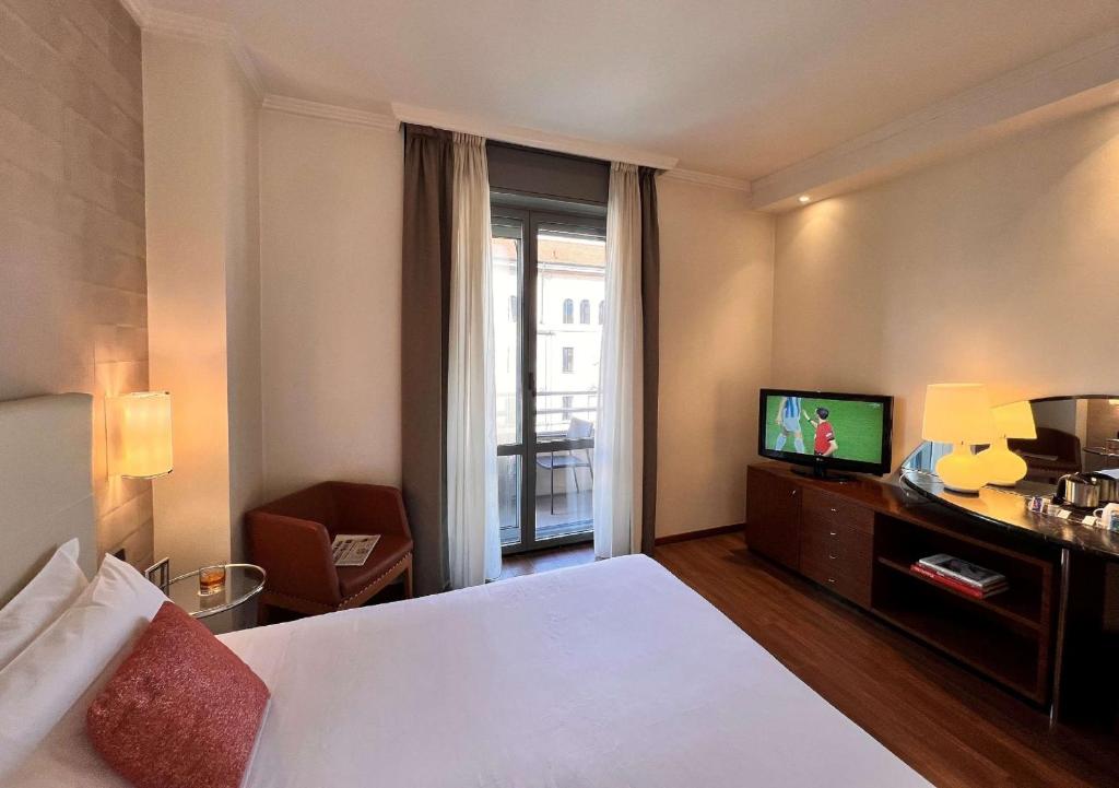 Postel nebo postele na pokoji v ubytování Best Western Hotel City