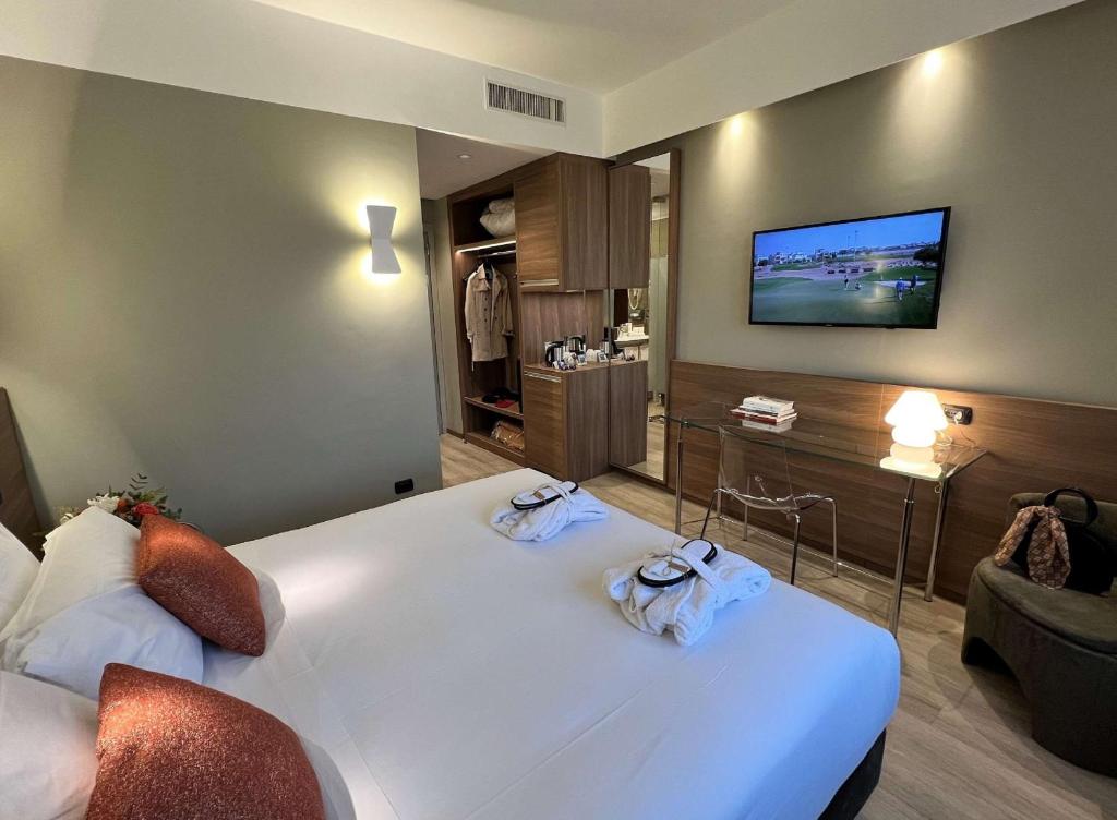 Postel nebo postele na pokoji v ubytování Best Western Hotel City