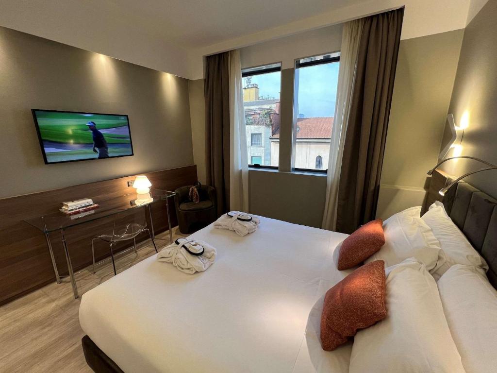 Postel nebo postele na pokoji v ubytování Best Western Hotel City