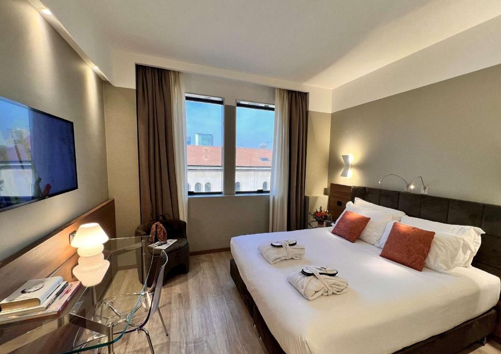 Postel nebo postele na pokoji v ubytování Best Western Hotel City