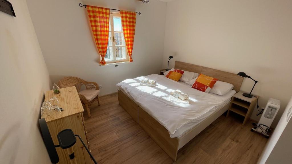 Postel nebo postele na pokoji v ubytování Penzion Pod Devítkou