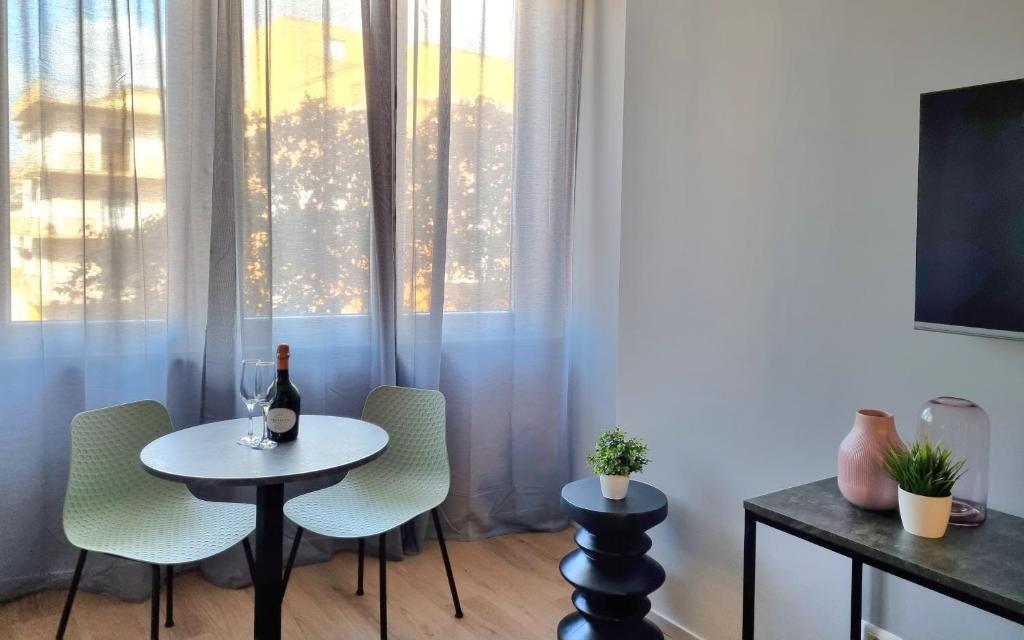 TV a/nebo společenská místnost v ubytování Residenza Gramsci