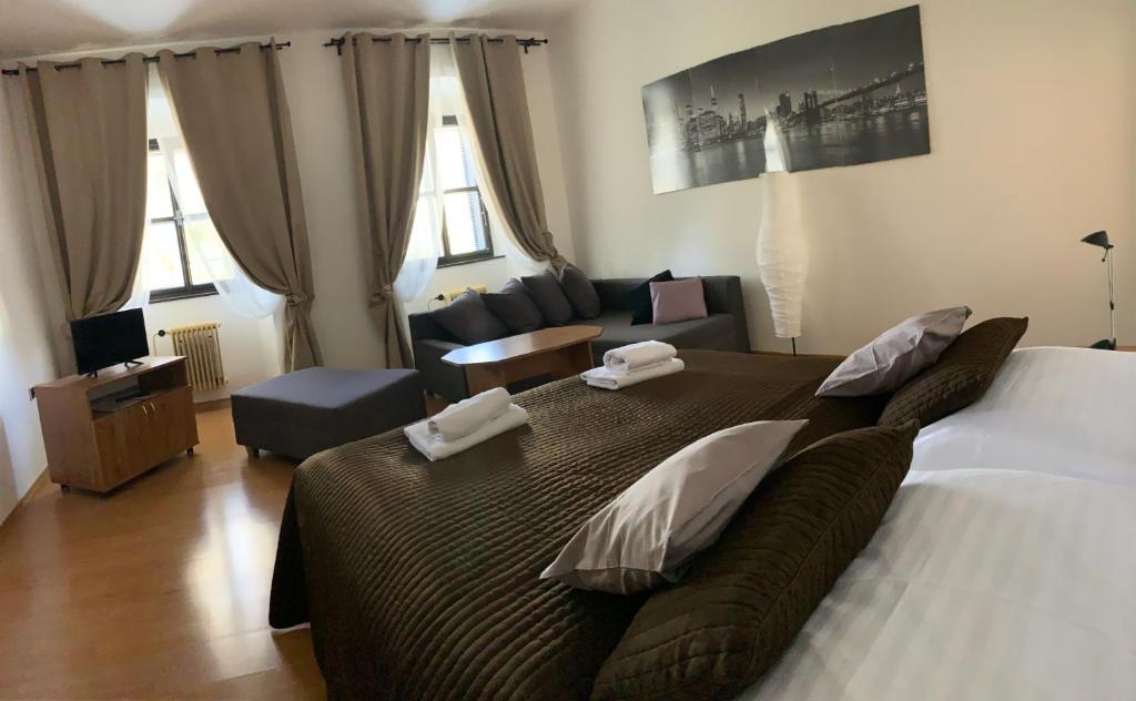 Postel nebo postele na pokoji v ubytování Hotel U Apoštola