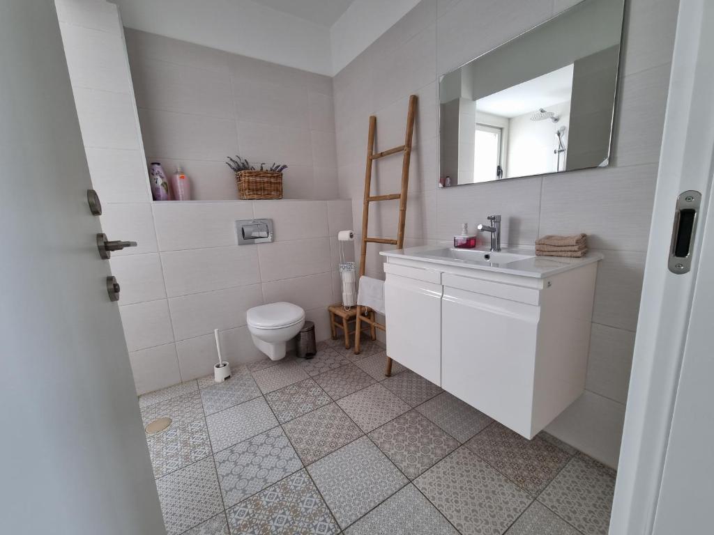 Koupelna v ubytování Albi Boutique Apartments