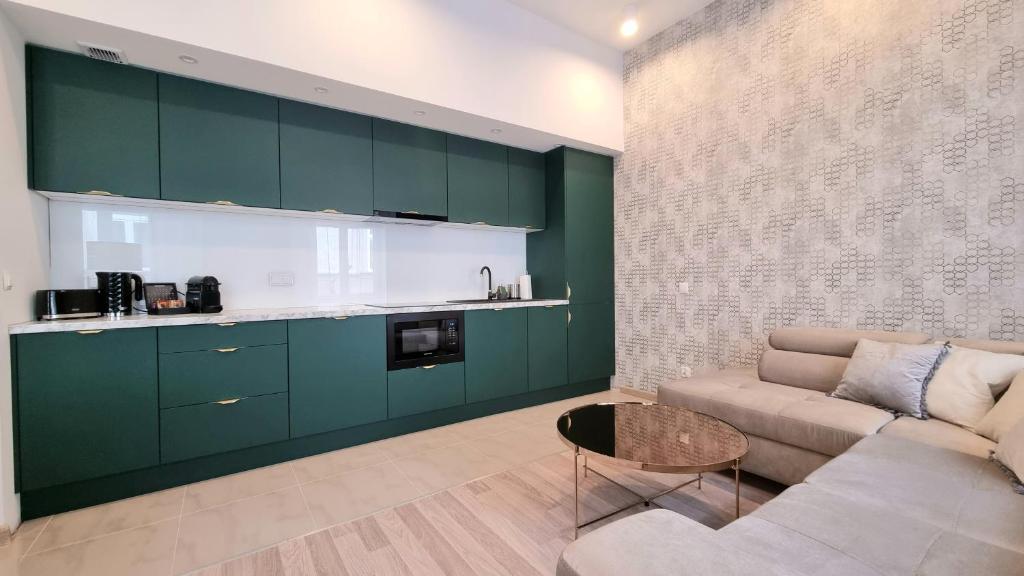 Kuchyňa alebo kuchynka v ubytovaní NOOK NOOK Apartments Katarzyny 2
