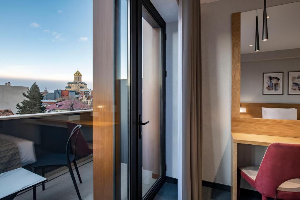 Balkón nebo terasa v ubytování Clocks Hotel Tbilisi