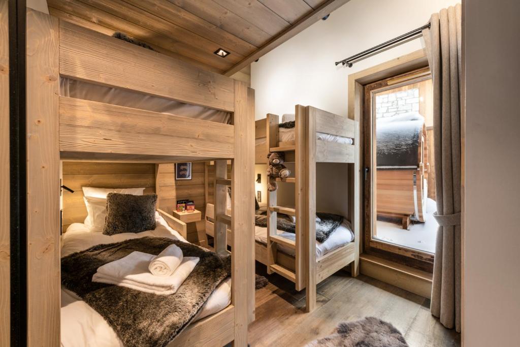 Postel nebo postele na pokoji v ubytování Vail Lodge by Alpine Resorts