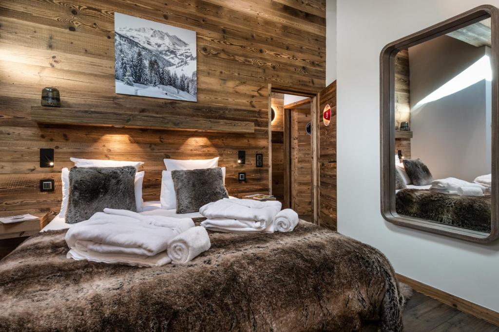 Postel nebo postele na pokoji v ubytování Vail Lodge by Alpine Resorts