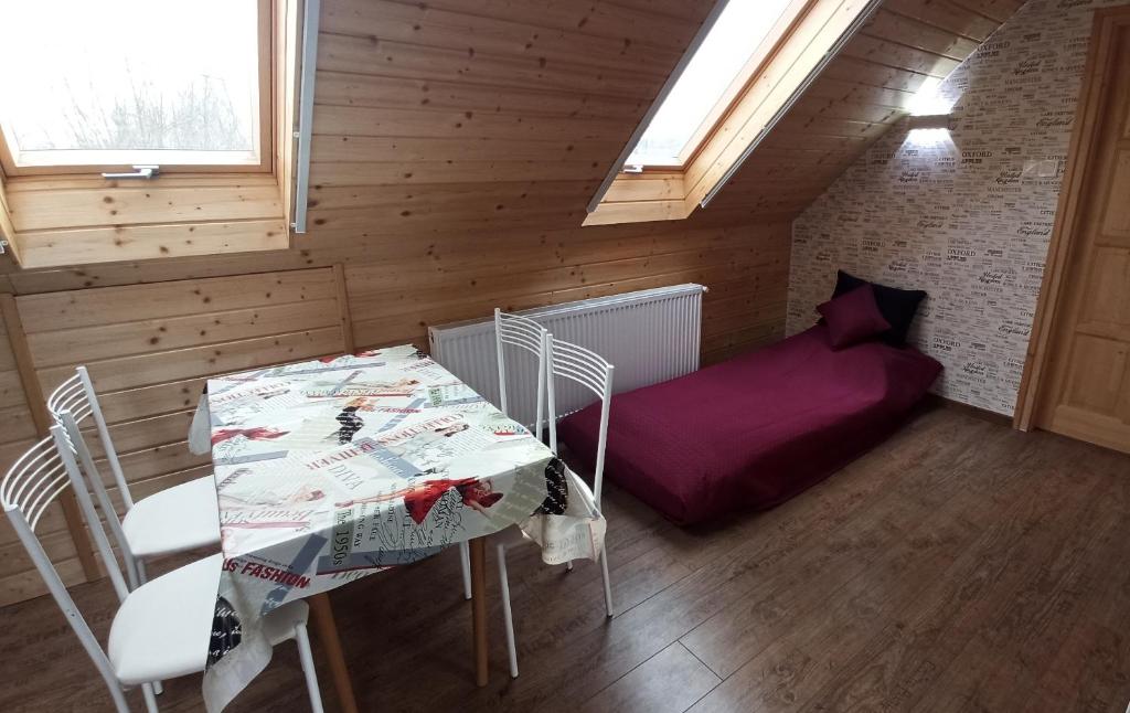 Postel nebo postele na pokoji v ubytování Marilyn Vendégház