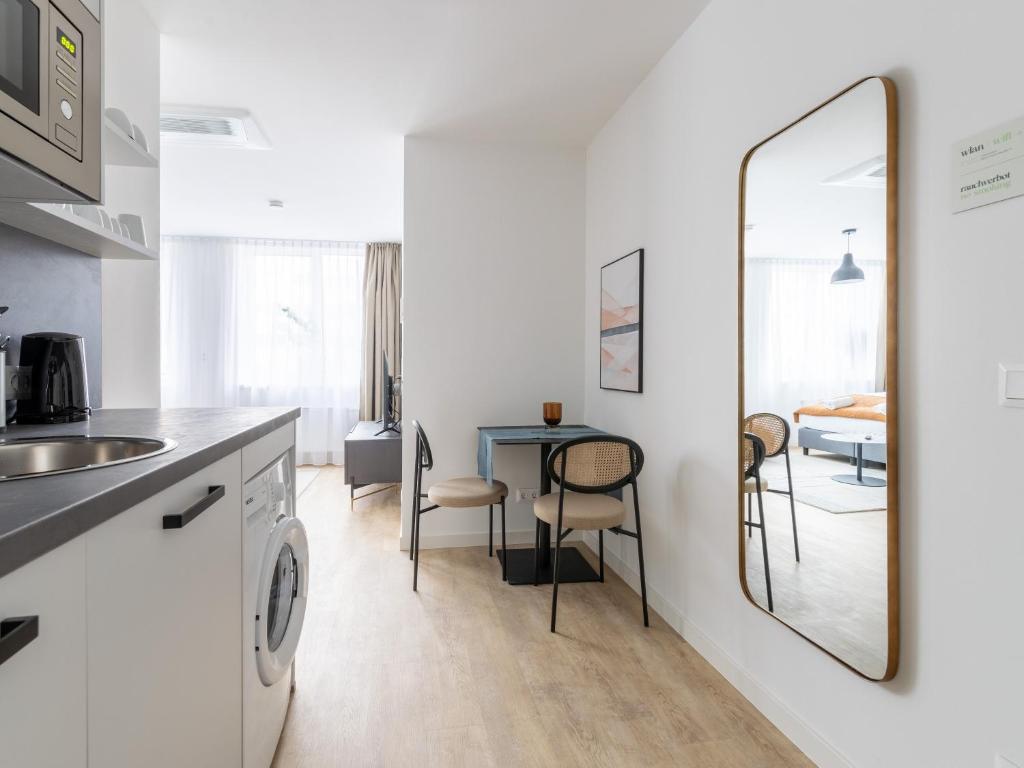 Kuchyň nebo kuchyňský kout v ubytování limehome Klagenfurt Karfreitstraße