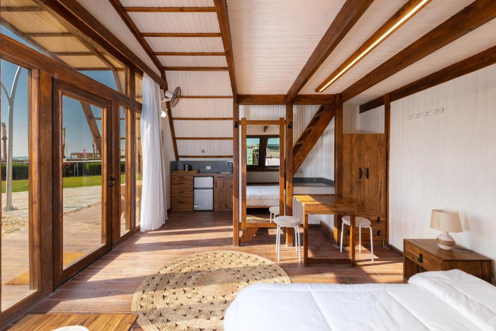 Postel nebo postele na pokoji v ubytování Matarma Beach Residence
