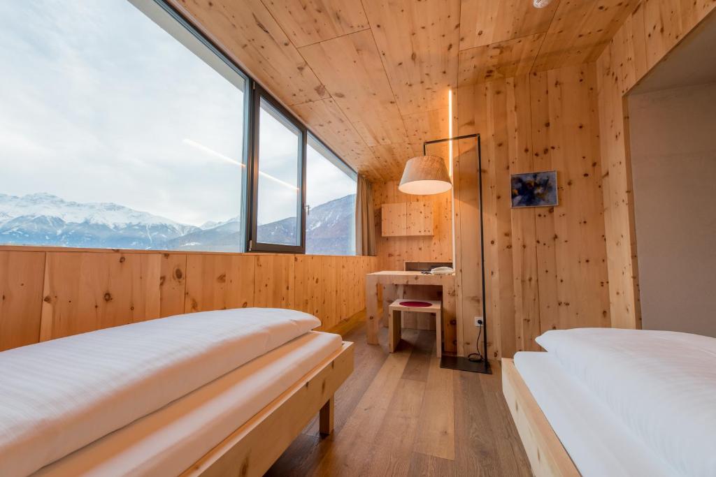 Postel nebo postele na pokoji v ubytování Bio Hotel Panorama