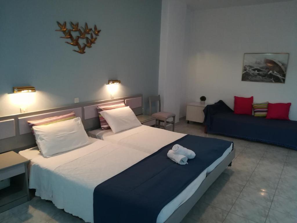 Postel nebo postele na pokoji v ubytování Stonegarden Studios