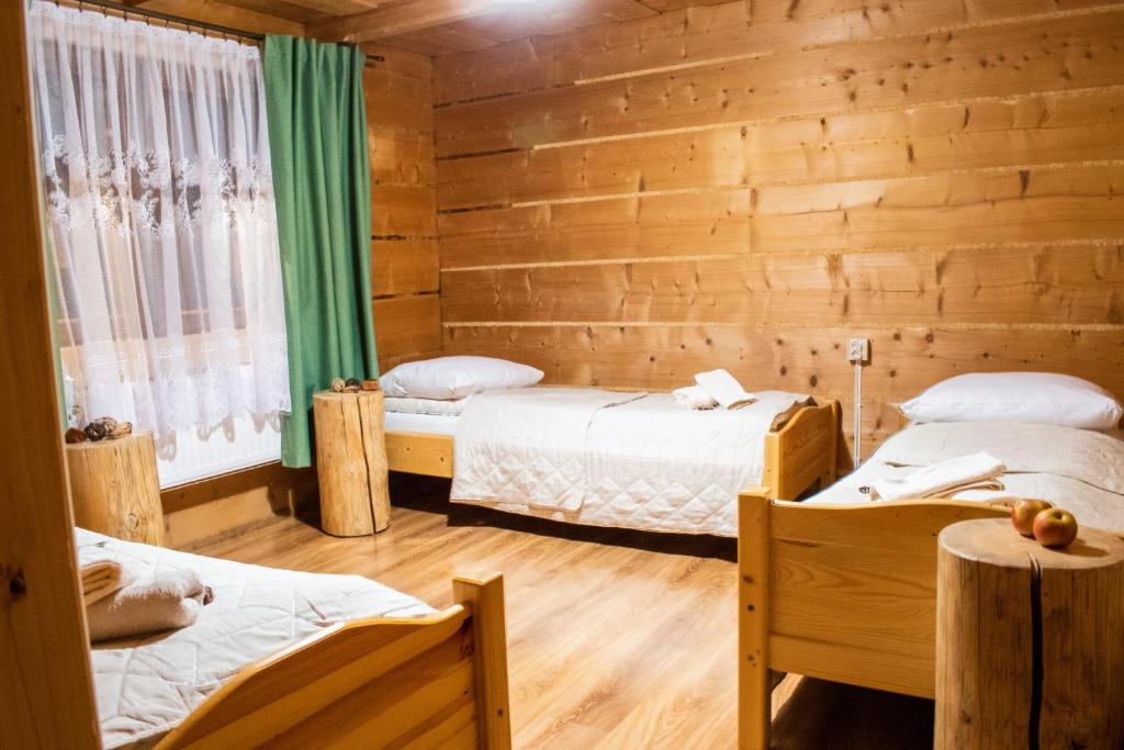 Posteľ alebo postele v izbe v ubytovaní Apartamenty Dwupoziomowe u Ciotki