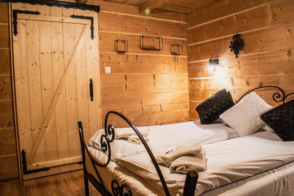 Posteľ alebo postele v izbe v ubytovaní Apartamenty Dwupoziomowe u Ciotki