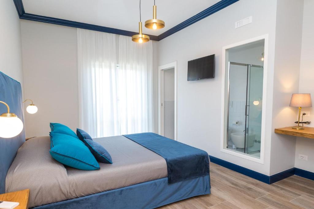 TV a/nebo společenská místnost v ubytování Sorrento Pool&Suites
