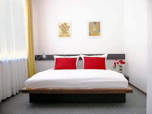 Postel nebo postele na pokoji v ubytování Hotel Central