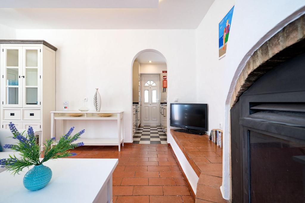 TV a/nebo společenská místnost v ubytování Casa Gaivota-Quinta do Paraíso, Praia Carvoeiro