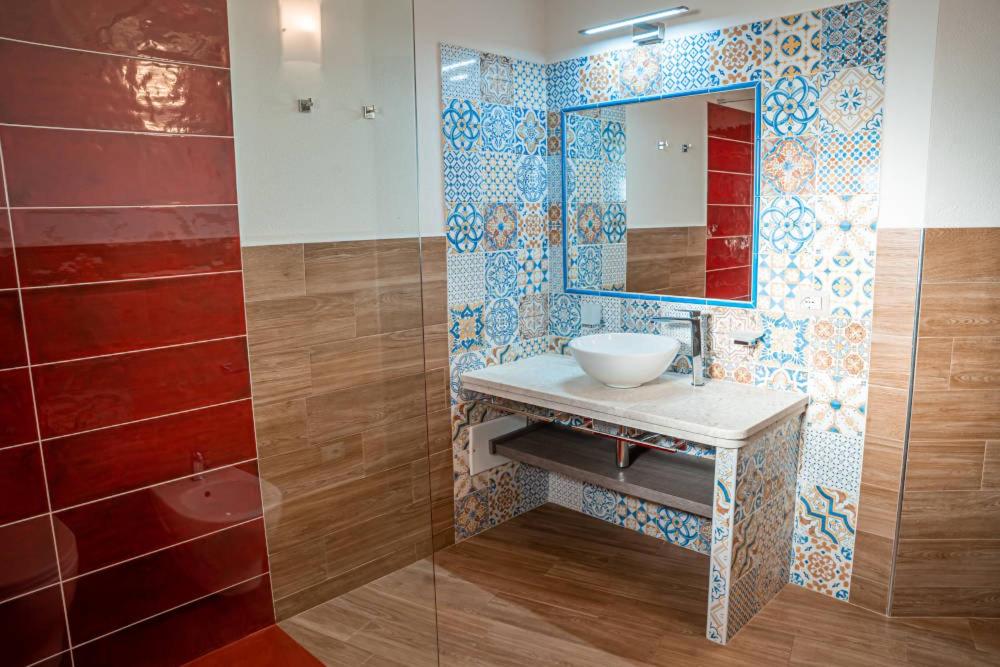 Koupelna v ubytování AQUA SARDINIA boutique hotel