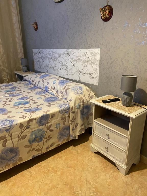 Posteľ alebo postele v izbe v ubytovaní Casa vacanza Giusi