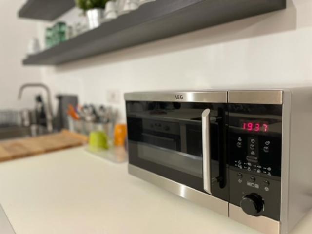 A kitchen or kitchenette at Modern Loft