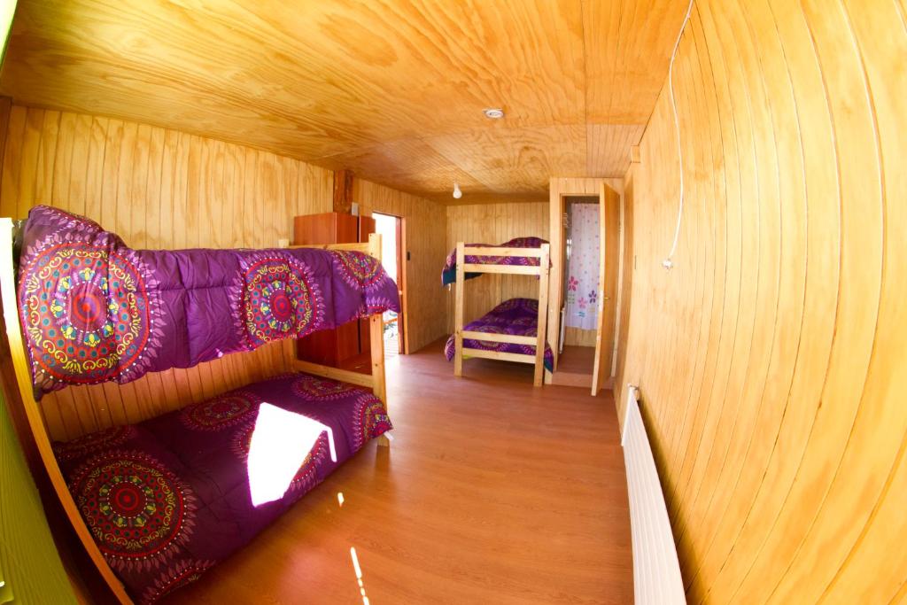 Postel nebo postele na pokoji v ubytování Hostal El Pichon