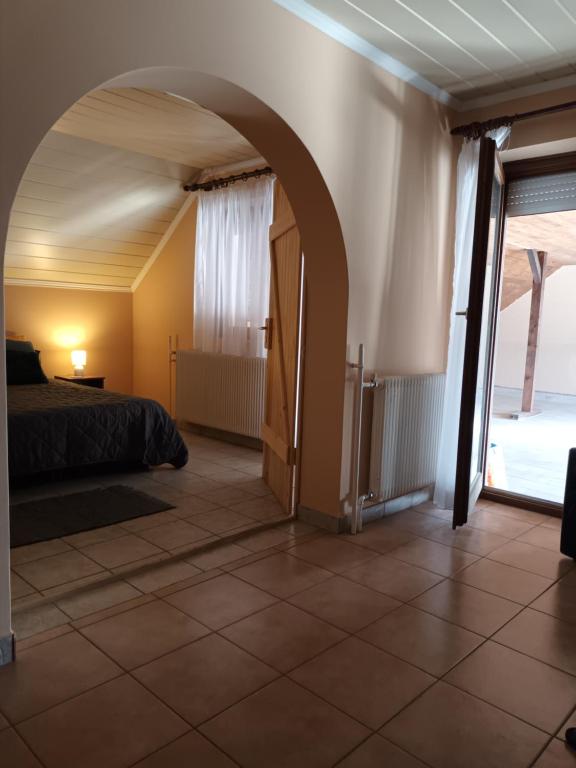 Posteľ alebo postele v izbe v ubytovaní Miranda Apartmanház
