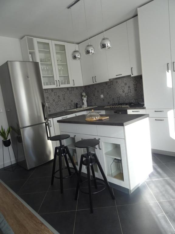 Kuchyň nebo kuchyňský kout v ubytování Apartment Rita