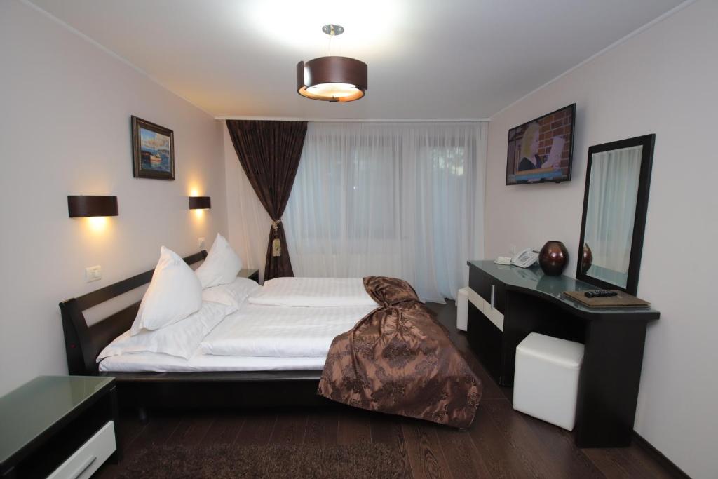 Postel nebo postele na pokoji v ubytování Complex Cochet