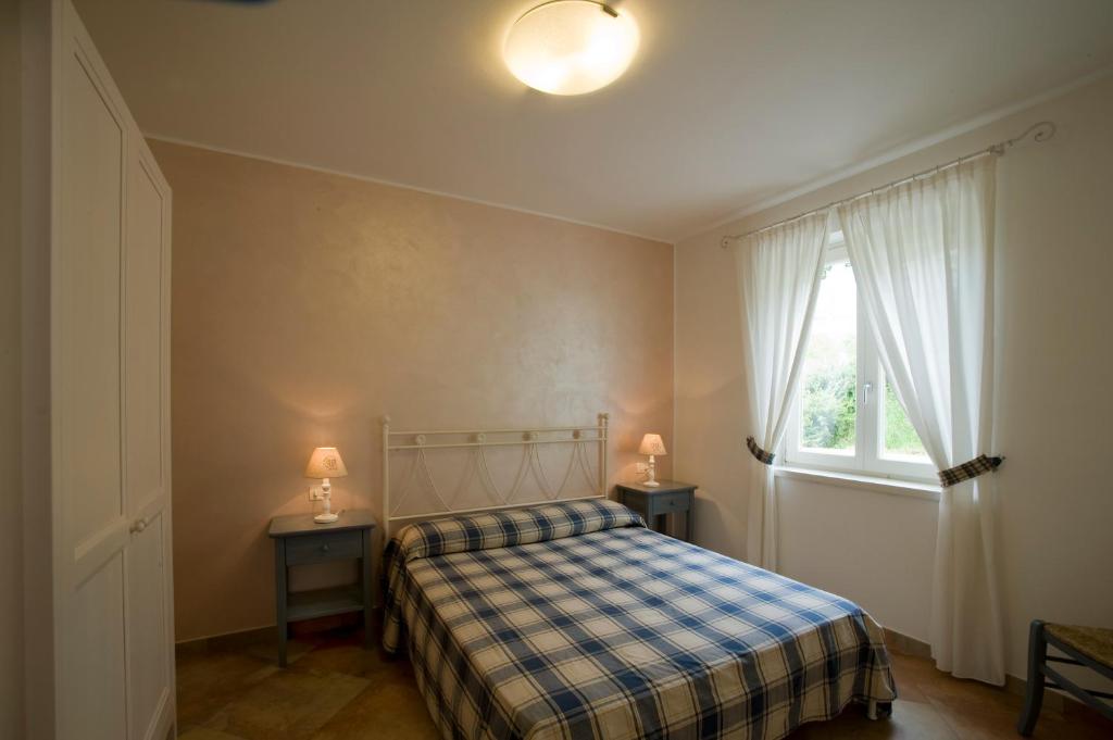Postel nebo postele na pokoji v ubytování Casale di Pegol