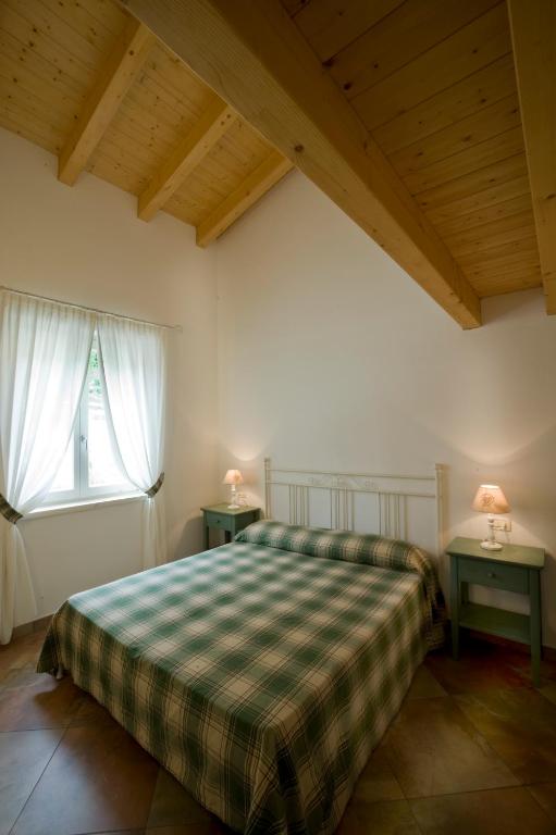 Postel nebo postele na pokoji v ubytování Casale di Pegol
