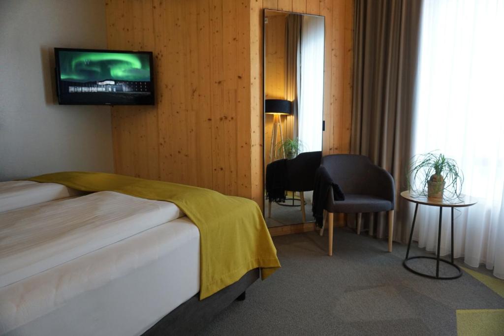 Postel nebo postele na pokoji v ubytování Landhotel